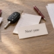 Bills, a car key and a home sketch grouped under Now, Next year and Longer term, representing different financial timeframes.